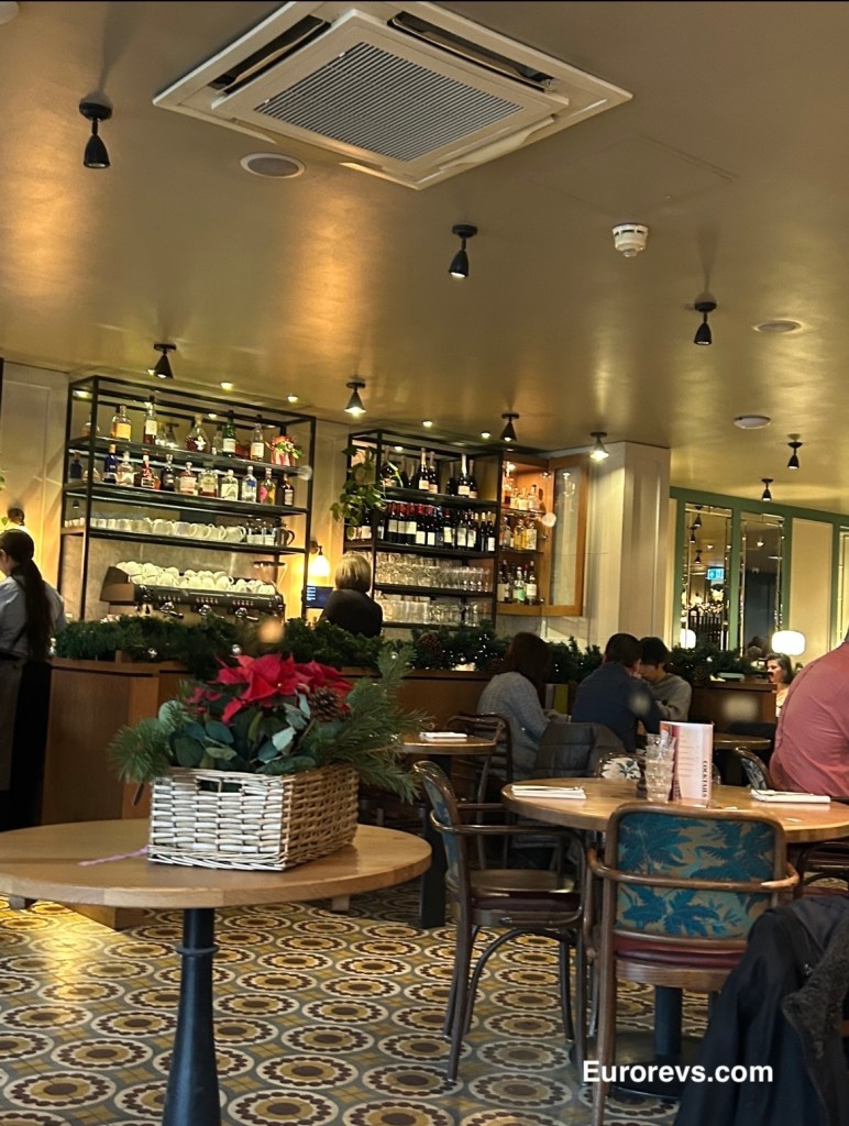 Interiors, showing the bar of the Côte Brasserie in Ealing, West London. 