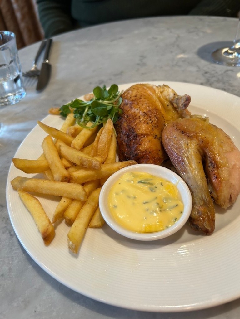 Corn-fed roasted chicken from Northern France, slathered in butter, roasted with fresh garlic, rosemary and thyme. Perfect for one. Served with free-flowing fries. 
