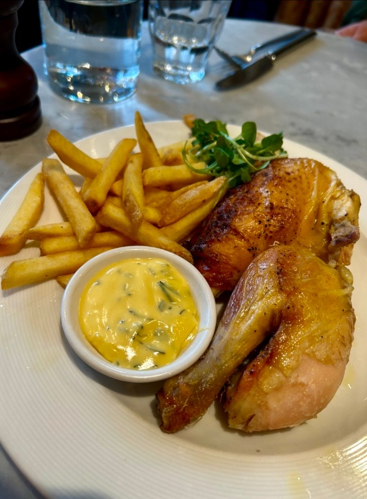 Half roast chicken main from Côte Brasserie in London. Described in the menu as corn-fed chicken from Northern France, slathered in butter, roasted with fresh garlic, rosemary and thyme. Perfect for one. 
